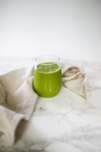 green smoothie with pineapple and basil