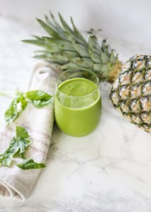 green smoothie with pineapple and basil