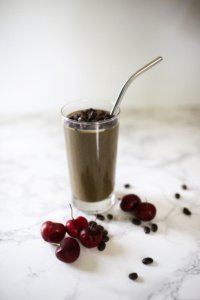 mocha cherry smoothie with coffee beans.