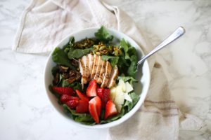 kale salad with strawberries and chicken
