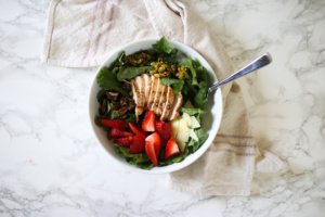 kale salad with strawberries and chicken