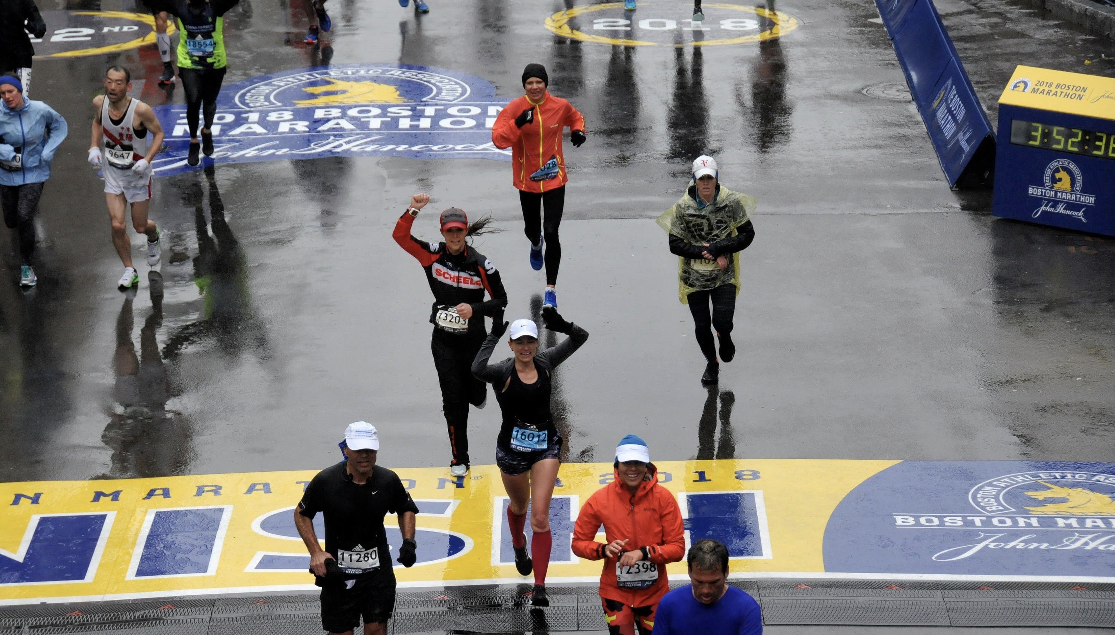 running in the rain | boston marathon finish line