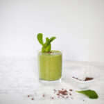 green smoothie with cocoa nibs and mint