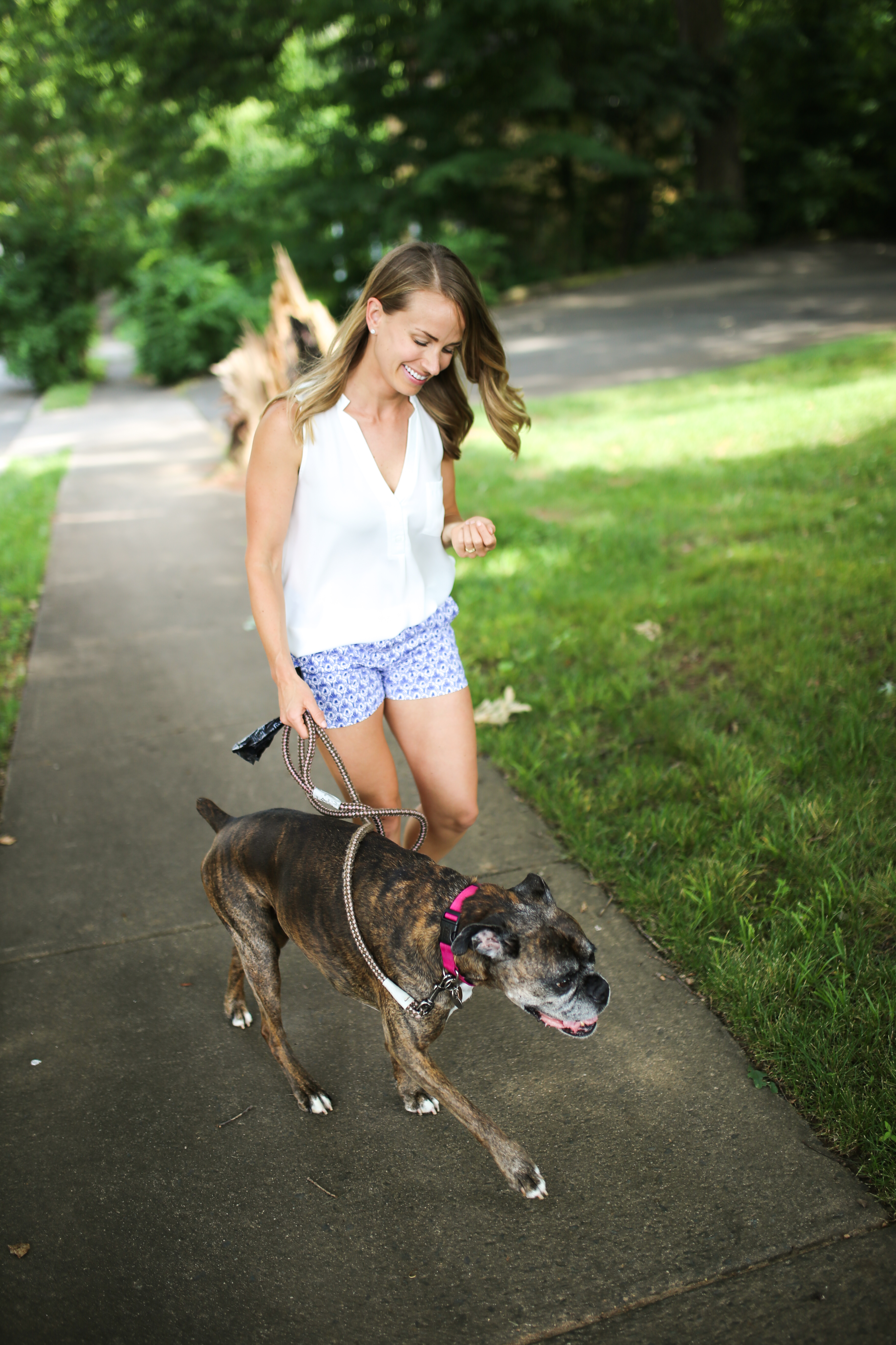 woman walking a boxer dog, Lifestyle Changes for Better Health
